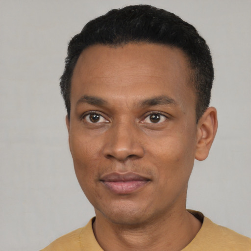 Neutral black young-adult male with short  black hair and brown eyes