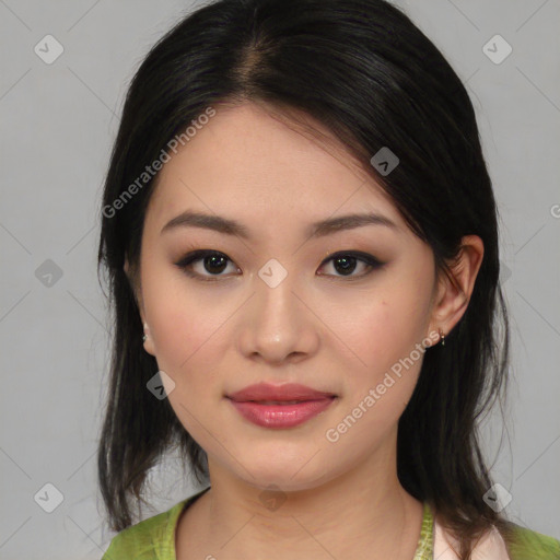 Joyful asian young-adult female with medium  black hair and brown eyes