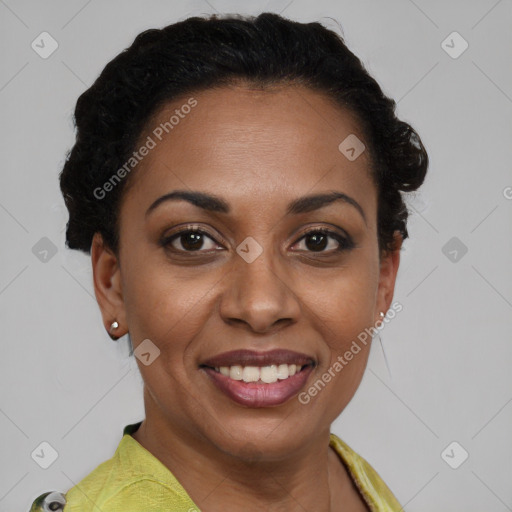 Joyful black young-adult female with short  brown hair and brown eyes