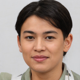 Joyful asian young-adult female with short  brown hair and brown eyes