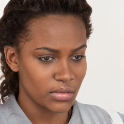 Neutral white young-adult female with short  brown hair and brown eyes