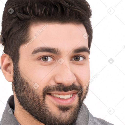 Joyful white young-adult male with short  black hair and brown eyes