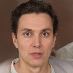 Neutral white adult male with short  brown hair and brown eyes