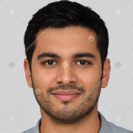 Joyful latino young-adult male with short  black hair and brown eyes