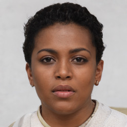 Neutral black young-adult female with short  brown hair and brown eyes