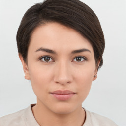 Neutral white young-adult female with short  brown hair and brown eyes