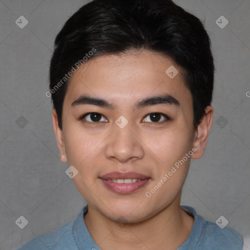 Joyful asian young-adult male with short  black hair and brown eyes