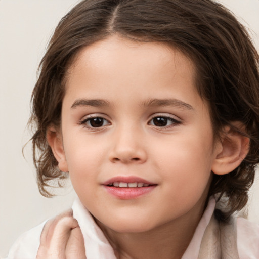 Joyful white child female with medium  brown hair and brown eyes