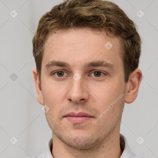 Neutral white young-adult male with short  brown hair and grey eyes