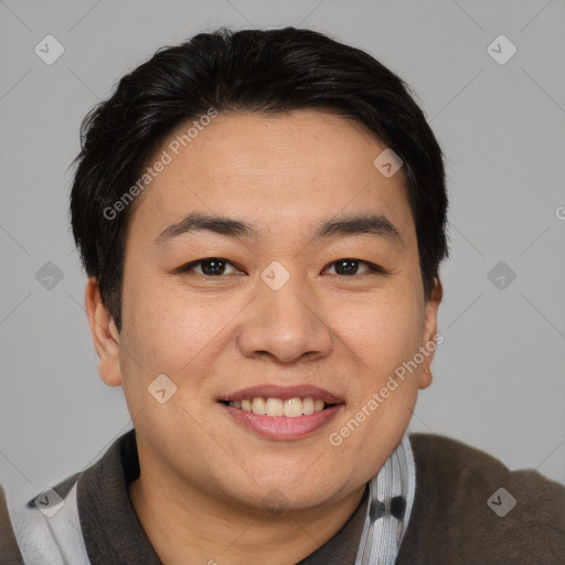 Joyful asian young-adult male with short  brown hair and brown eyes