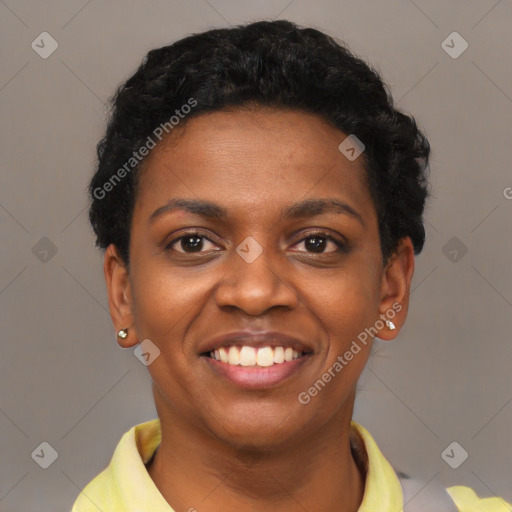 Joyful black young-adult female with short  black hair and brown eyes