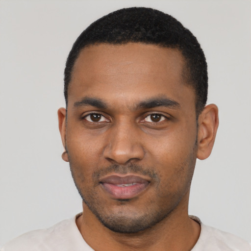 Neutral black young-adult male with short  black hair and brown eyes