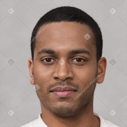 Neutral latino young-adult male with short  black hair and brown eyes