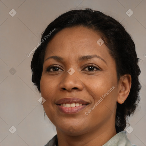 Joyful black young-adult female with medium  brown hair and brown eyes