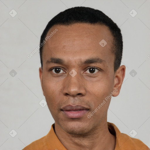 Neutral latino adult male with short  black hair and brown eyes