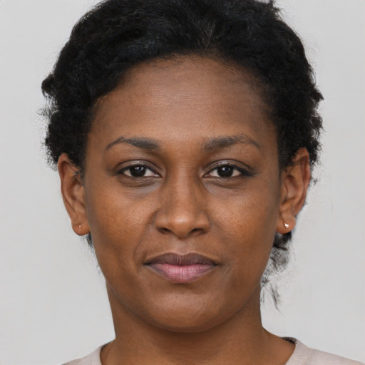 Neutral black young-adult female with short  brown hair and brown eyes
