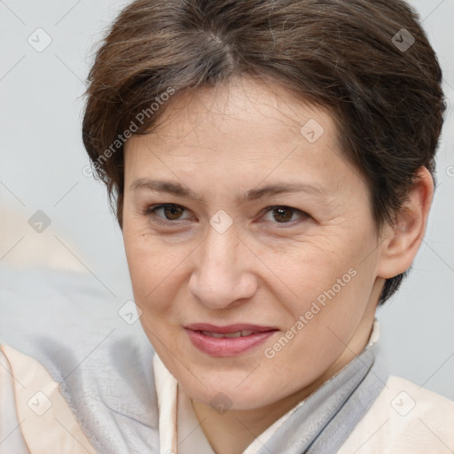 Joyful white adult female with short  brown hair and brown eyes