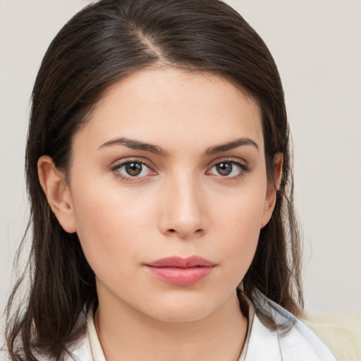 Neutral white young-adult female with medium  brown hair and brown eyes