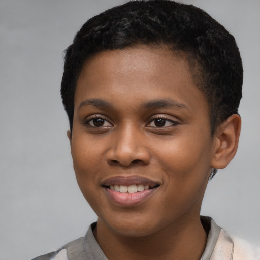 Joyful black young-adult female with short  black hair and brown eyes