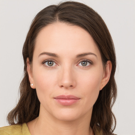 Neutral white young-adult female with medium  brown hair and brown eyes