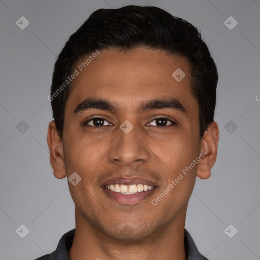 Joyful latino young-adult male with short  black hair and brown eyes