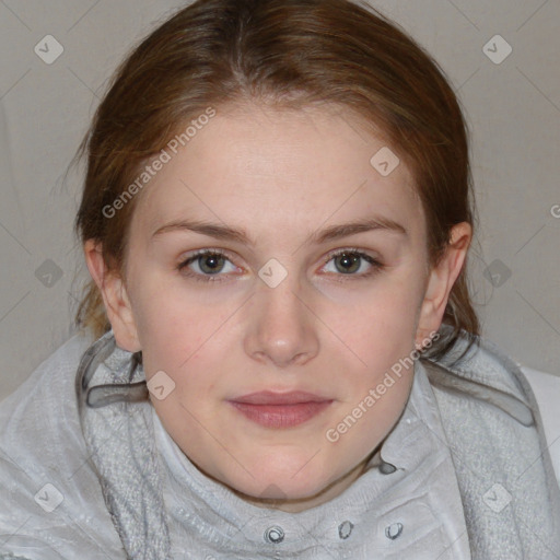 Joyful white young-adult female with medium  brown hair and blue eyes