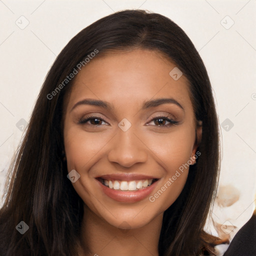 Joyful latino young-adult female with long  brown hair and brown eyes