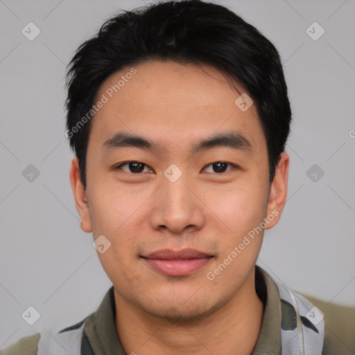 Joyful asian young-adult male with short  black hair and brown eyes