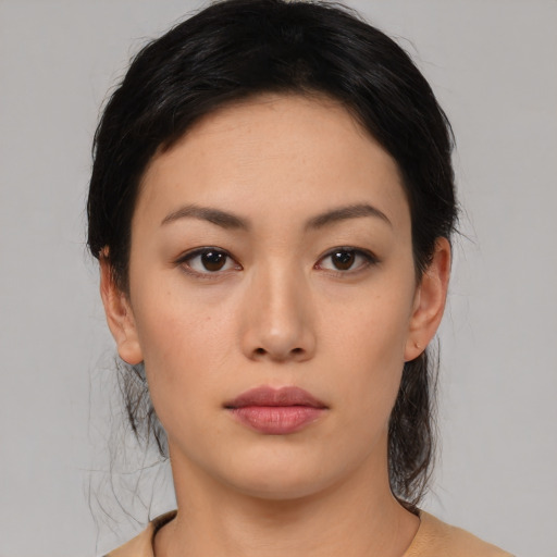 Neutral latino young-adult female with medium  black hair and brown eyes