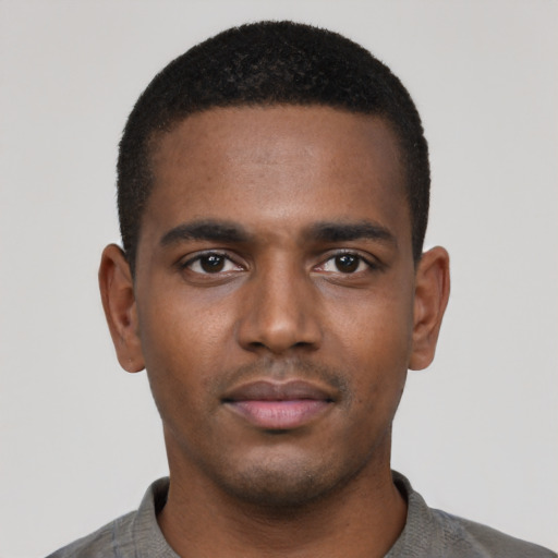 Neutral black young-adult male with short  black hair and brown eyes