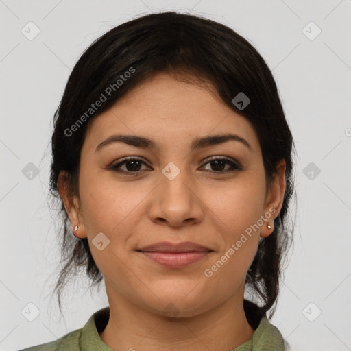 Joyful latino young-adult female with medium  brown hair and brown eyes