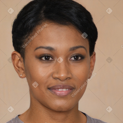 Joyful black young-adult female with short  black hair and brown eyes