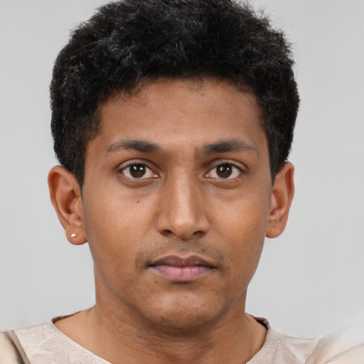 Neutral latino young-adult male with short  brown hair and brown eyes