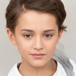 Joyful white child female with short  brown hair and brown eyes