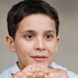 Joyful white child male with short  brown hair and brown eyes