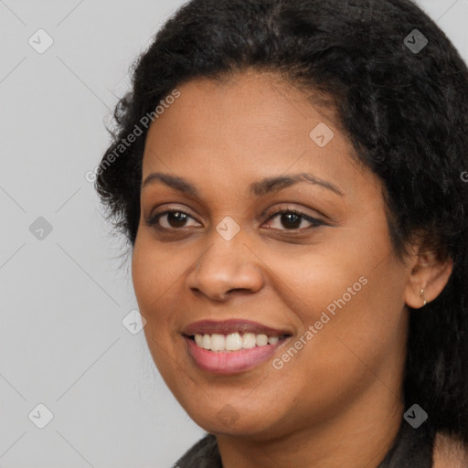 Joyful latino young-adult female with long  brown hair and brown eyes