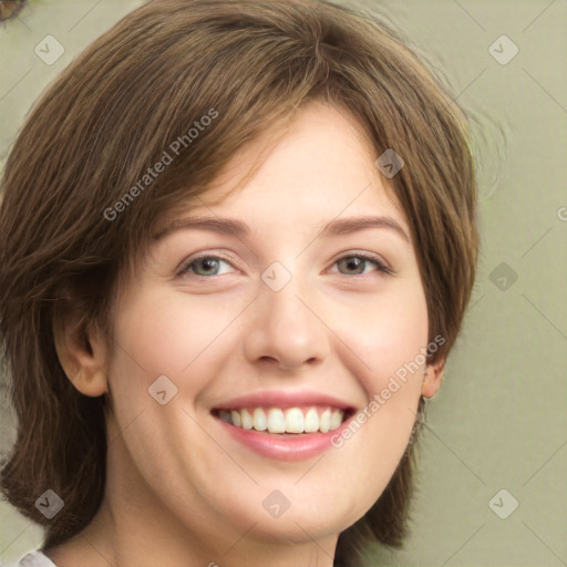 Joyful white young-adult female with medium  brown hair and green eyes