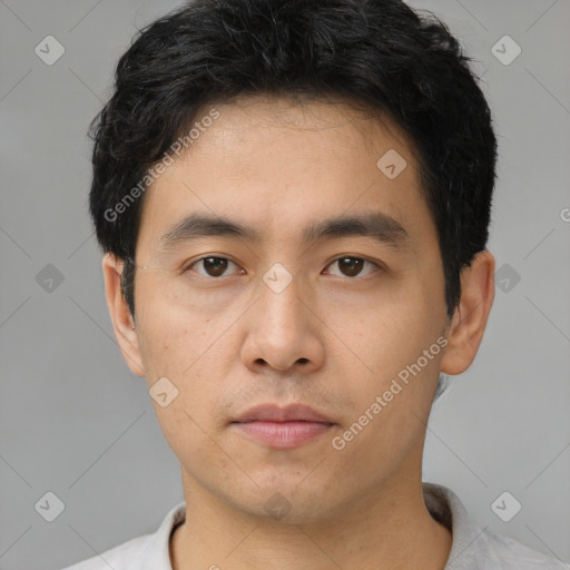 Neutral asian young-adult male with short  black hair and brown eyes