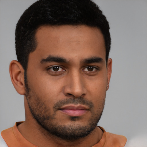 Neutral latino young-adult male with short  black hair and brown eyes