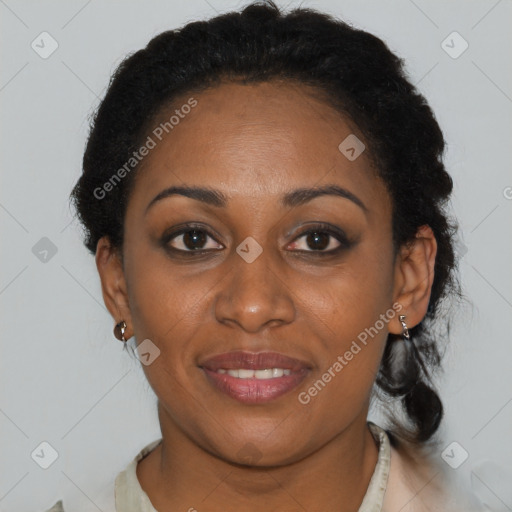 Joyful black adult female with short  brown hair and brown eyes