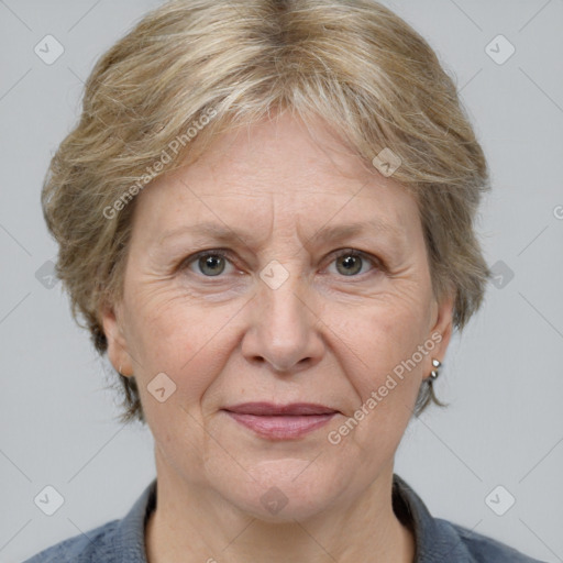 Joyful white middle-aged female with medium  brown hair and grey eyes