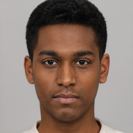 Neutral black young-adult male with short  black hair and brown eyes