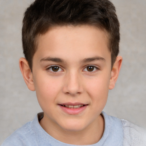 Joyful white child male with short  brown hair and brown eyes