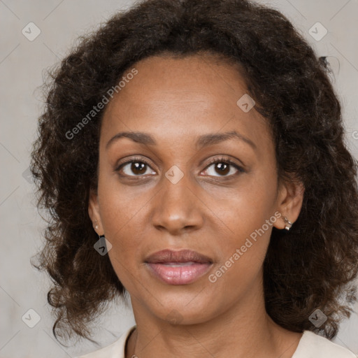 Neutral black adult female with medium  brown hair and brown eyes