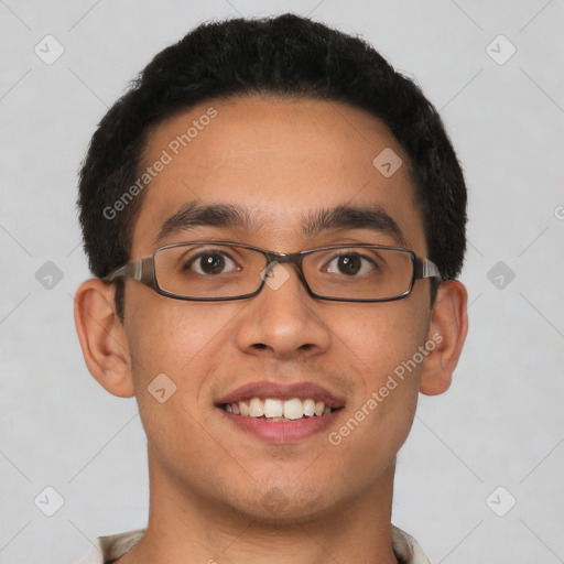 Joyful white young-adult male with short  black hair and brown eyes