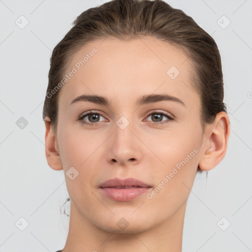 Neutral white young-adult female with medium  brown hair and brown eyes