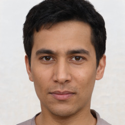 Neutral asian young-adult male with short  black hair and brown eyes