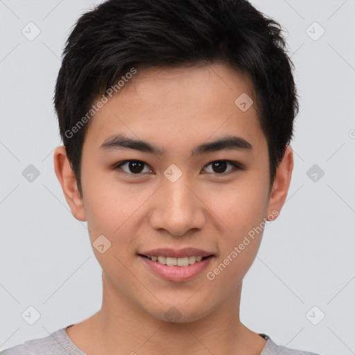 Joyful asian young-adult male with short  brown hair and brown eyes