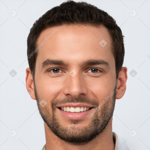 Joyful white young-adult male with short  brown hair and brown eyes