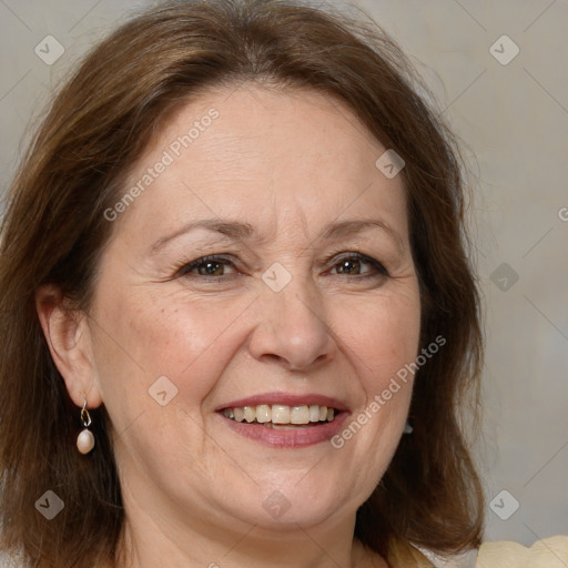 Joyful white adult female with medium  brown hair and brown eyes